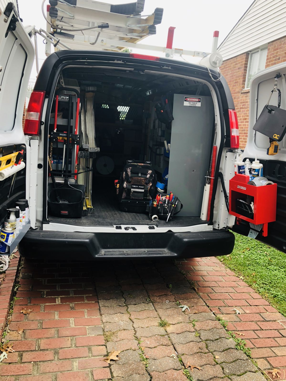 technician loading a treated kit into the van
